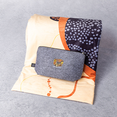 Printed scarf and embroidered denim pouch gift set