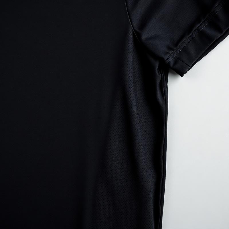 Close-up of black dri-fit performance t-shirt mesh fabric